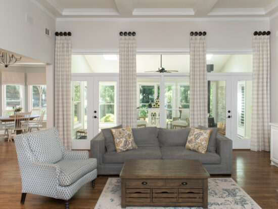 Horizontal striped pinch please drapery panels hung on medallions
